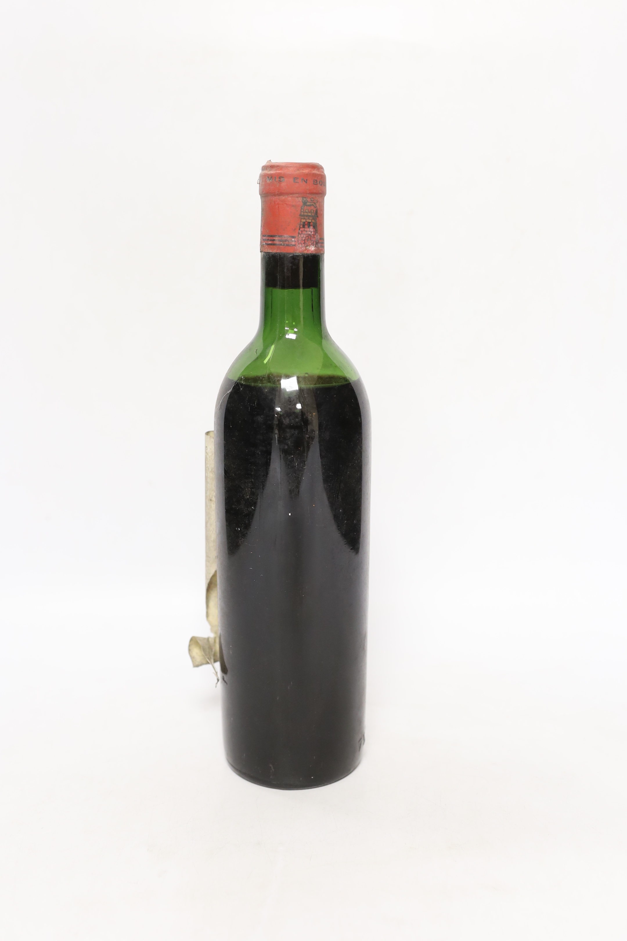 One bottle of 1959 Chateau Latour wine, label damaged